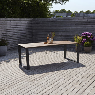 Slim outdoor outlet dining table